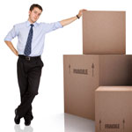 Man leaning against boxes